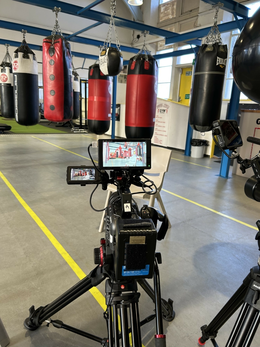 Camera setup taking photos in a boxing gym